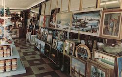 A color photograph of the inside of a store. On the shelves you see cans, kicknacks, and paintings. Willow Grove, PA Postcard Po Postcard