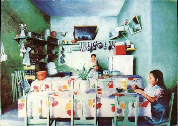 Cocina en Verde' - green kitchen with two people in it, color photograph