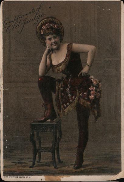 Old Judge Cigaretttes ad, with photo of woman on a chair.