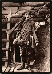 Charlie Chaplin dressed as a soldier Postcard