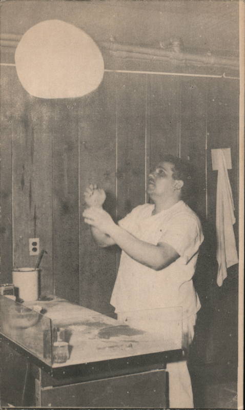 Man Throwing Pizza Dough at Fonzo's Italian Restaurant and Pizzeria Philadelphia Pennsylvania