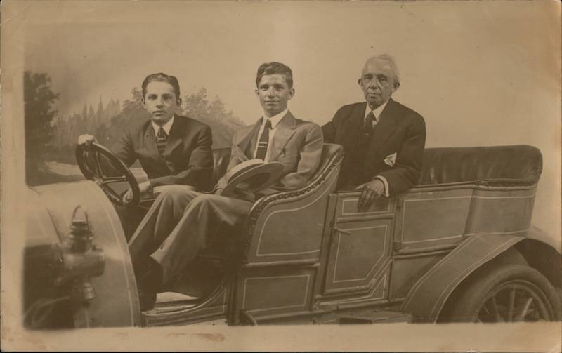 Three gentlemen in a convertible 1920's Studio portrait