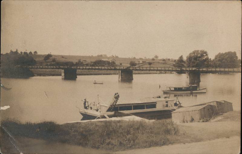 Boat and Bridge on a River Riverboats