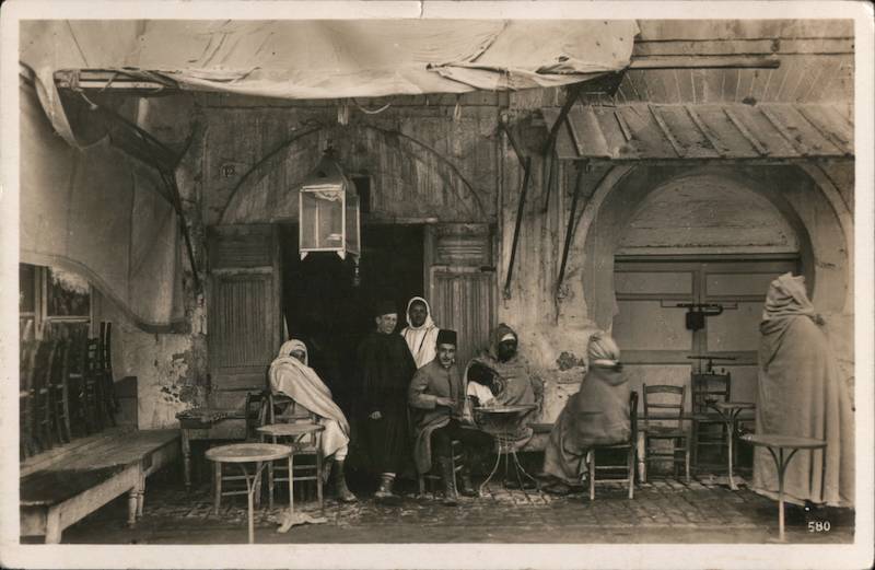 A Group of 7 People in a Cafe