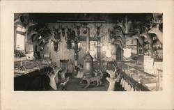 Interior View of Taxidermist Shop or General Store - Deer Heads Postcard