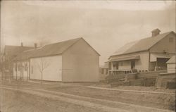 Building with Wood Planks in the Front Postcard