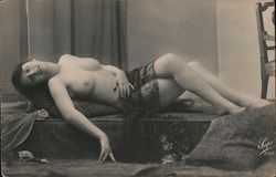 Naked Woman Lounging on bed Postcard