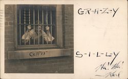 man behind a jail cell window holding on to the bars Bloomington, IN Men Postcard Postcard Postcard