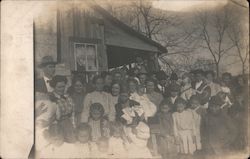 Group Picture of Men, Women, and Children Postcard