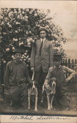 Three Men Pose with Dogs Postcard