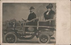 Man and Woman Pose in Automobile Postcard