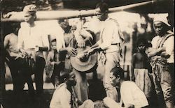 Group of People Working and Carrying a Heavy Load Postcard