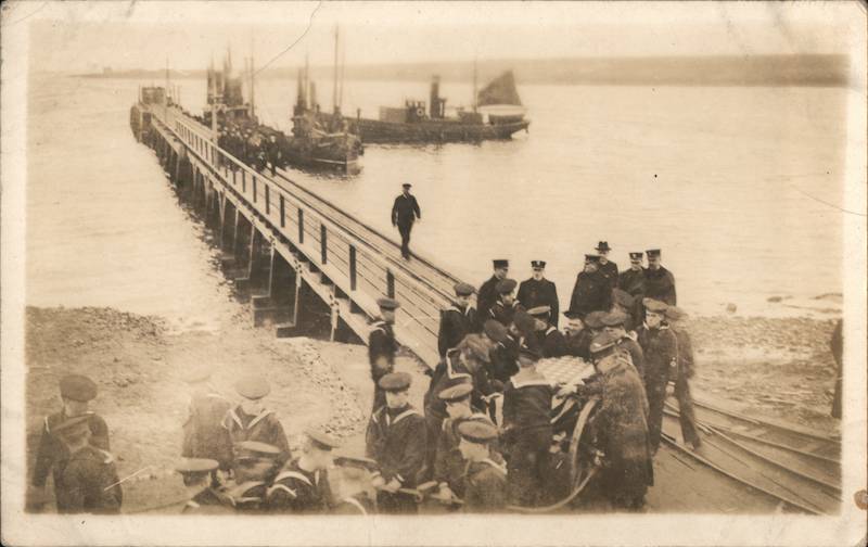 Naval Officer Funeral Procession Down Dock Towards Ships on Water