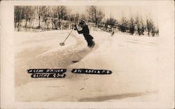 Man skiing down slope Postcard