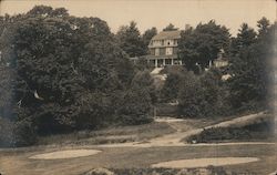 Golf course greens view facing clubhouse on hill Postcard