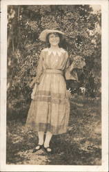 Woman Standing Among Flowers, Florida 1909 Postcard