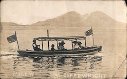 Small Covered Boat American Flag "Alice W" Postcard