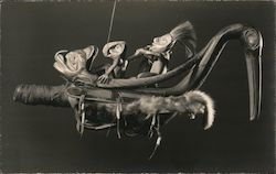 Sculpture of primitive boat Postcard
