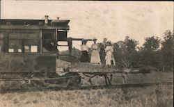 Women standing on Wrecked rain Postcard