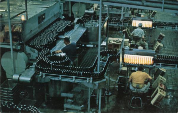 Bottles being inspected at the Schlitz Brewing Company Milwaukee Wisconsin
