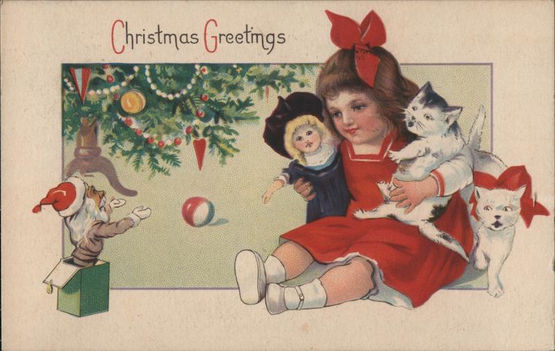 Christmas Greetings - Girl holding a Doll and Kitten
