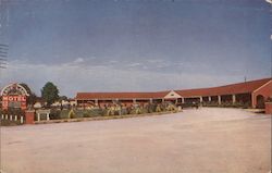 Exterior of Cave Land Motel Postcard