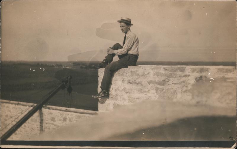Southwestern College Man atop East Wall of Richardson Hall Winfield Kansas