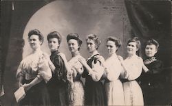 7 Women Posing for Photograph with Arms on Shoulder Postcard