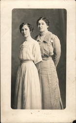 Studio Photograph of Two Women Posing in Long Dresses Postcard
