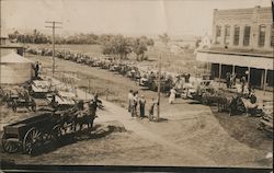 22 Horse-Drawn Grain Binders on Street Burden, KS Postcard Postcard Postcard