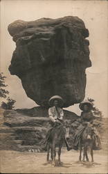 Couple on Donkeys, Sombreros Balanced Rock, Garden of the Gods Postcard