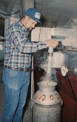 Owner Mr. Puffenberger and Evaporator, Puffenberger Sugar Orchards Postcard
