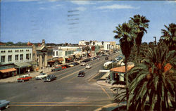 Beach Street, looking north, the principal business center of Daytona Beach, Florida. Postcard