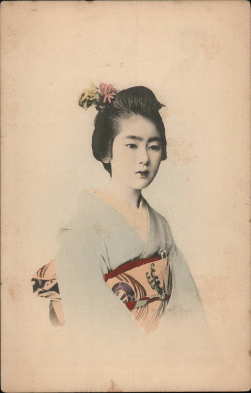 Young Japanese Woman with typical dress and hairstyle