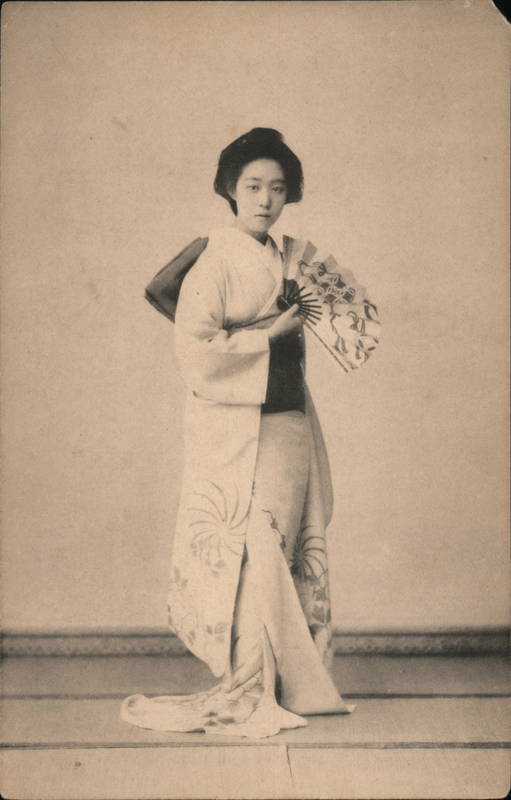 Japanese woman with typical dress and fan