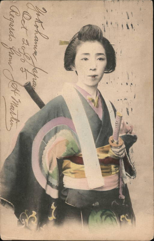 Japanase woman with typical dress and sword