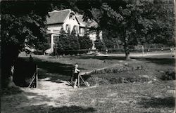 Large Home and Young Boy Postcard