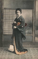 Japanese young woman with typical dress and hairstyle Postcard