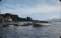 Serene Scene of Water, Boats and Mountains in Background Postcard