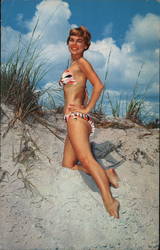 Woman Posing in Bikini on Sandy Hill with Beach Grass and Cloudy Sky Postcard