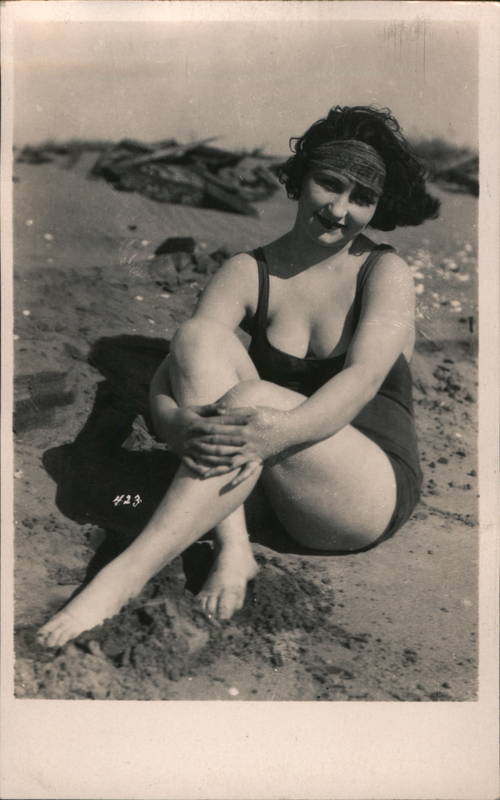 Flapper Woman in bathing suit on beach Swimsuits & Pinup