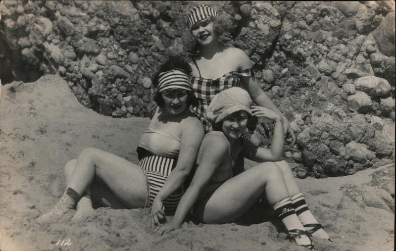 Three Flapper Women modelling swimwear on a beach Swimsuits & Pinup