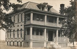 4 story brick building Postcard