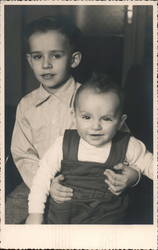 Baby Sitting On Brother's Lap Postcard