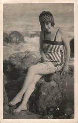 Woman on rock Postcard