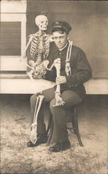 Soldier holds skeleton - Military Doctor? Postcard