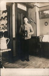 Young Man with Camera Postcard