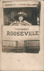 Woman poses in front of mock up of ship Theodore Roosevelt Postcard
