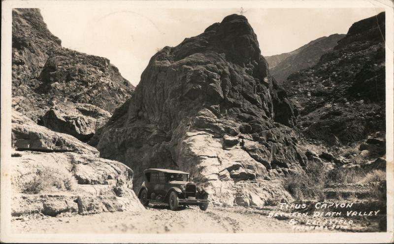 Car driving through Tirus Canyon Death Valley California