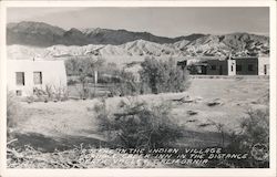 A Scene in the Indian Village, Furnace Creek Inn in the Distance Postcard
